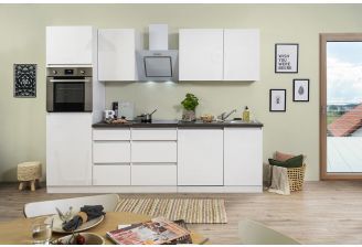 Keuken greeploos in hoogglans wit met inbouwapparatuur