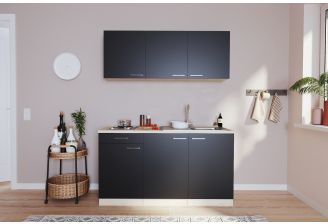 Mini keuken met zwarte fronten en elektrische kookplaat