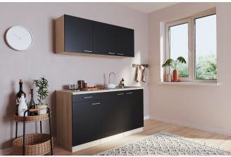 Mini keuken met zwarte fronten en elektrische kookplaat zijkant